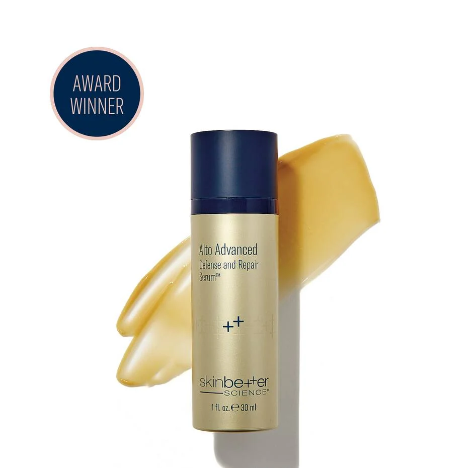 A navy skinbetter science Alto Advanced Defense and Repair Serum bottle on a white background, beside a golden serum swatch and an “Award Winner” roundel.